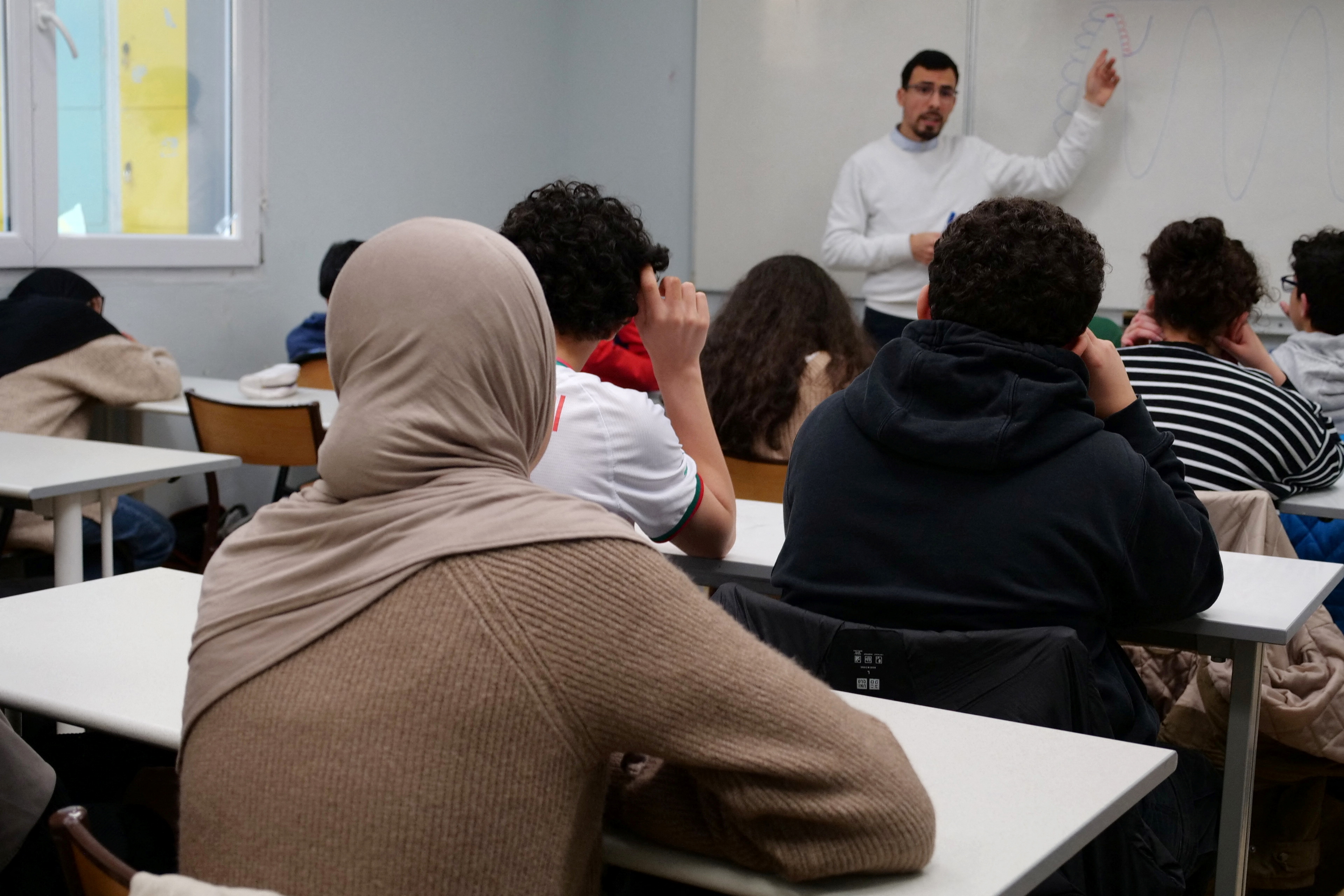 An Islamic ethics class at the Averroes school, France's biggest Muslim educational institution that has lost its state funding on grounds of administrative failures and questionable teaching practises. /Ardee Napolitano/Reuters
